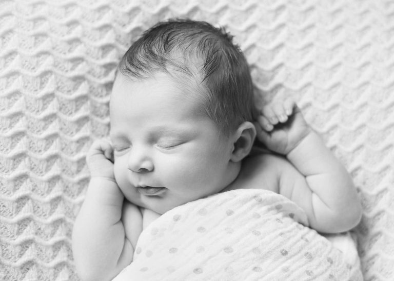black and white portrait of newborn girl